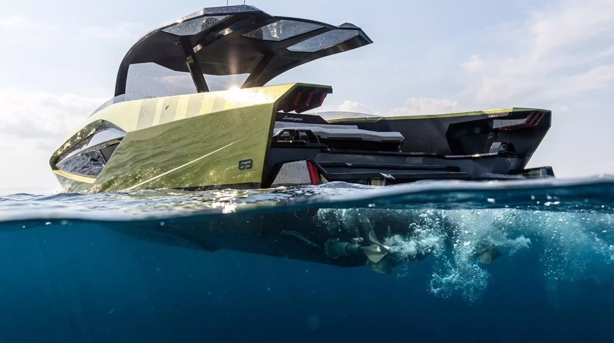 acht rendering at sea from split waterline angle showing sleek yacht design and propeller bubbles underwater