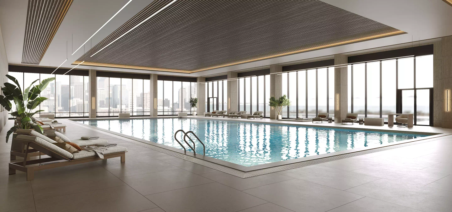 Pool rendering of a luxury indoor lap pool with lounge chairs and floor-to-ceiling city views